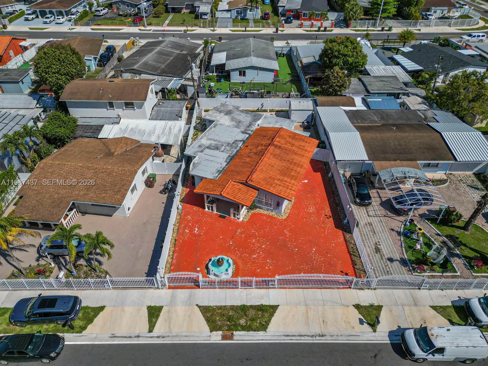 871 Southeast 5th Place Hialeah, FL 33010 - Photo 3 of 39 an aerial view of a house with a swimming pool and outdoor space