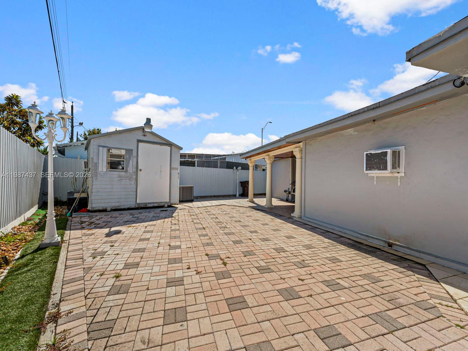 871 Southeast 5th Place Hialeah, FL 33010 - Photo 34 of 39 a house view with a outdoor space