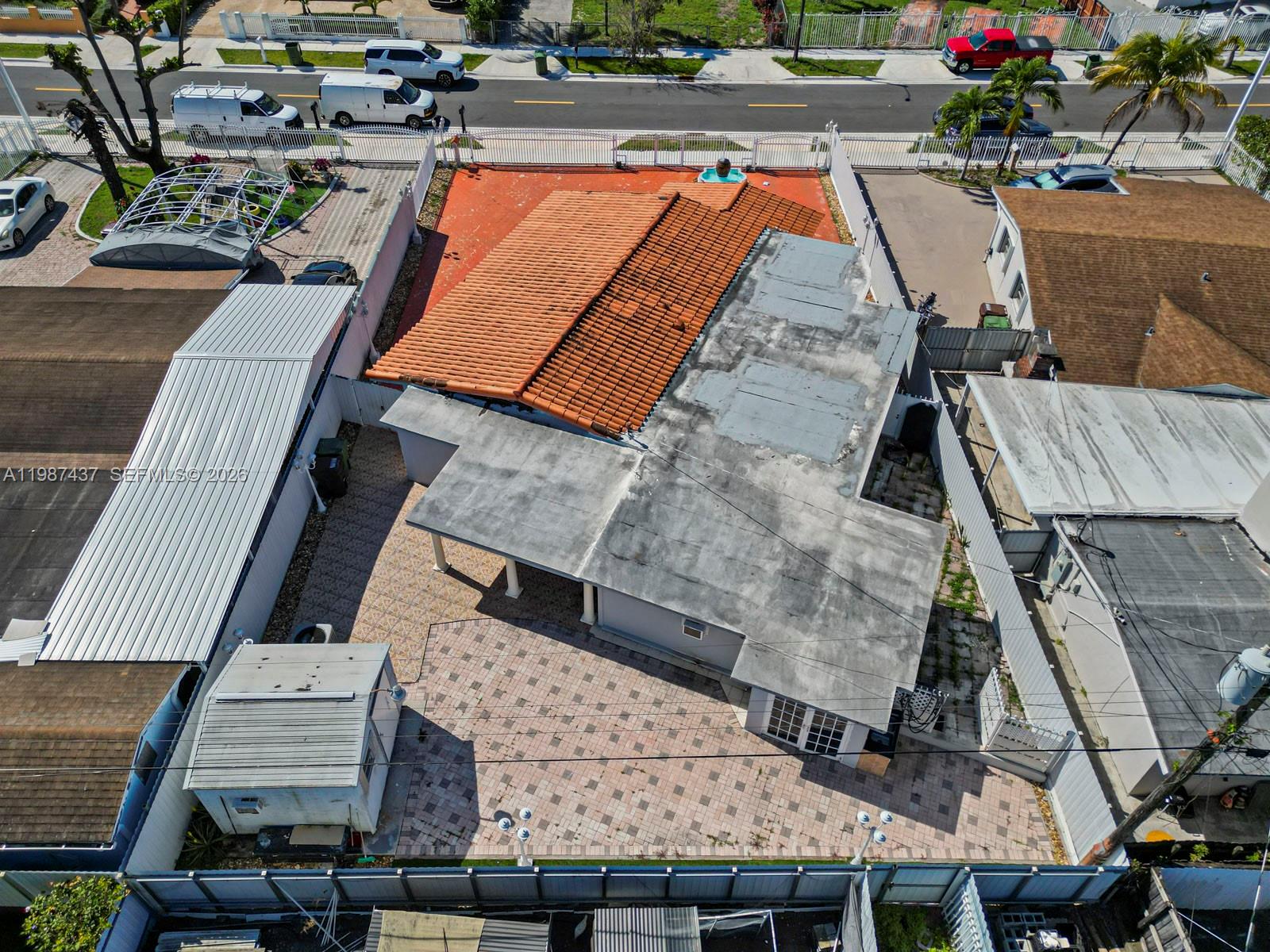 871 Southeast 5th Place Hialeah, FL 33010 - Photo 5 of 39 an aerial view of a building with outdoor space