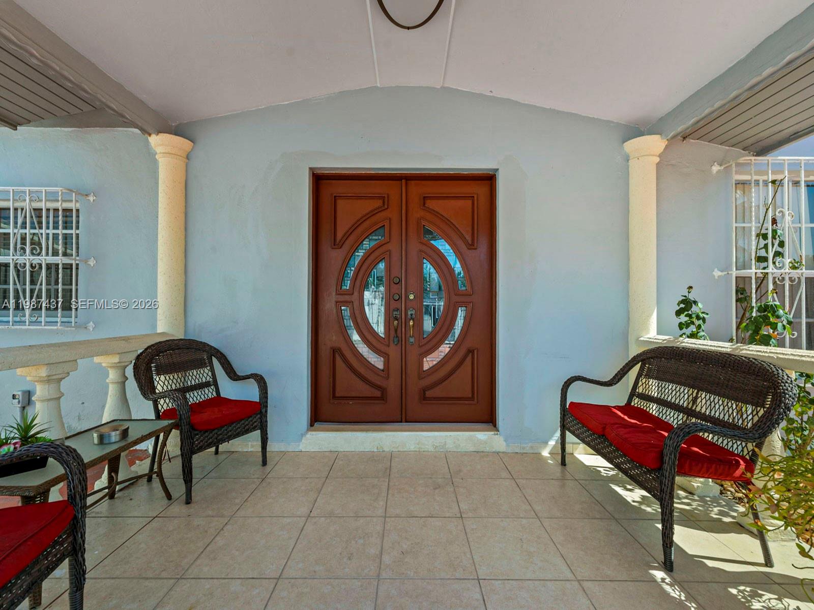 871 Southeast 5th Place Hialeah, FL 33010 - Photo 8 of 39 a living room with furniture and rug