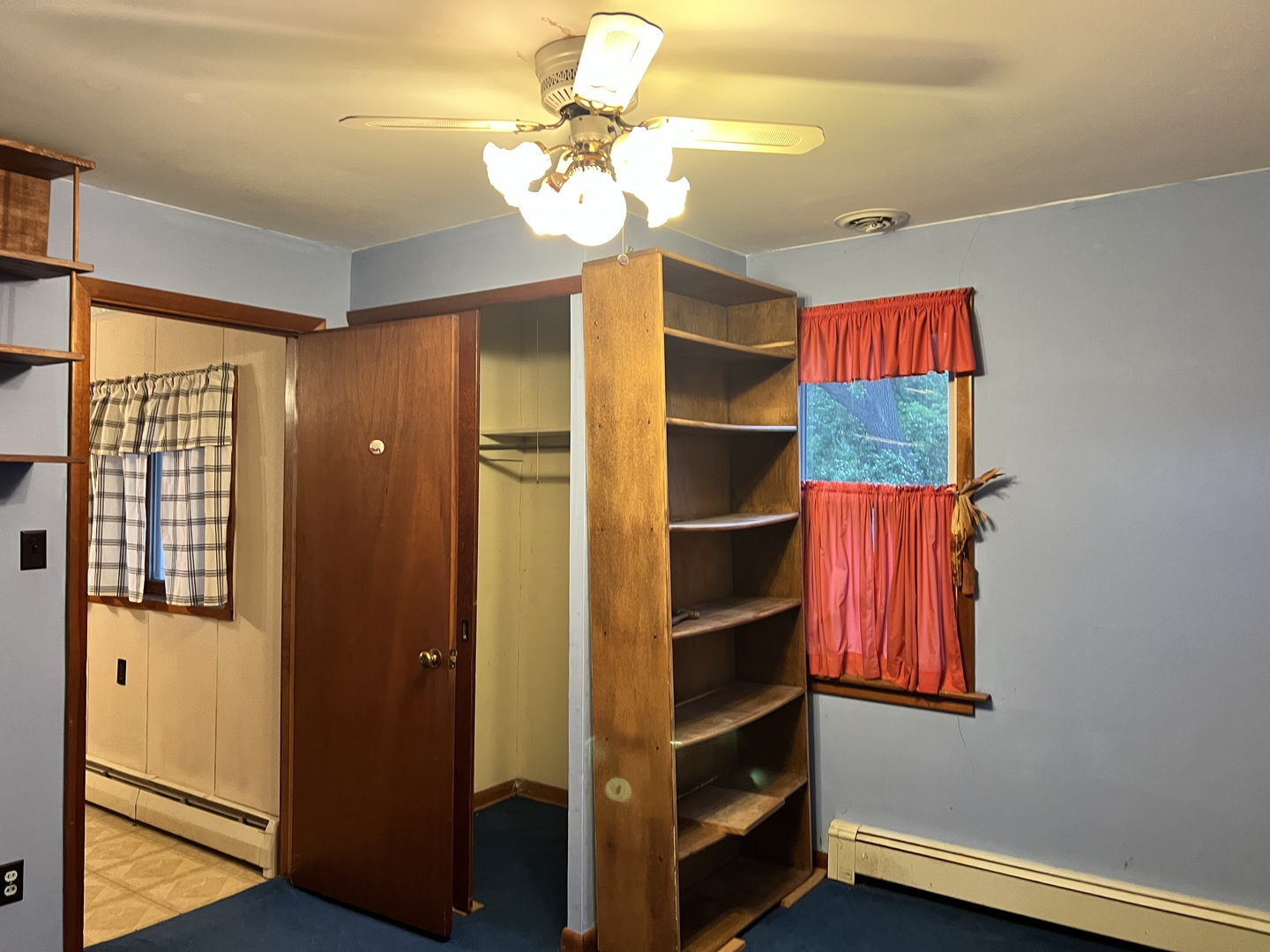 356 East Fulton Street Paxton, IL 60957 - Photo 4 of 25 a view of a room with window and cabinet