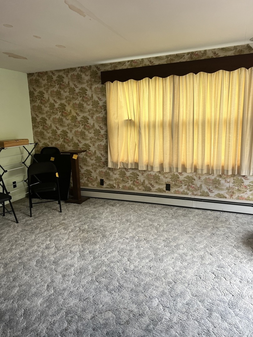 356 East Fulton Street Paxton, IL 60957 - Photo 7 of 25 a view of wooden floor and windows in a room