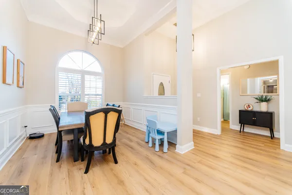 a view of a livingroom with furniture and a window