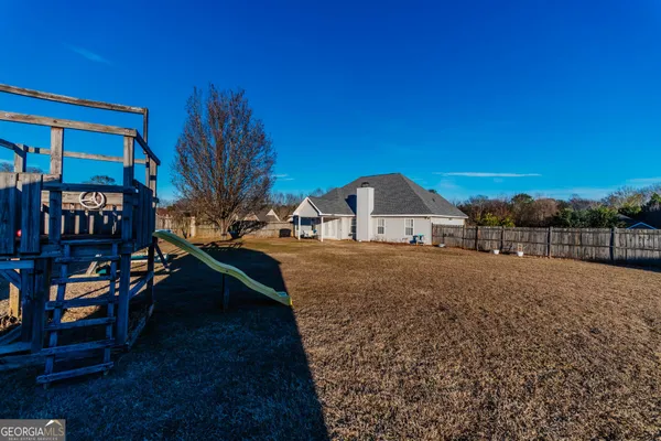 a house view with a garden space