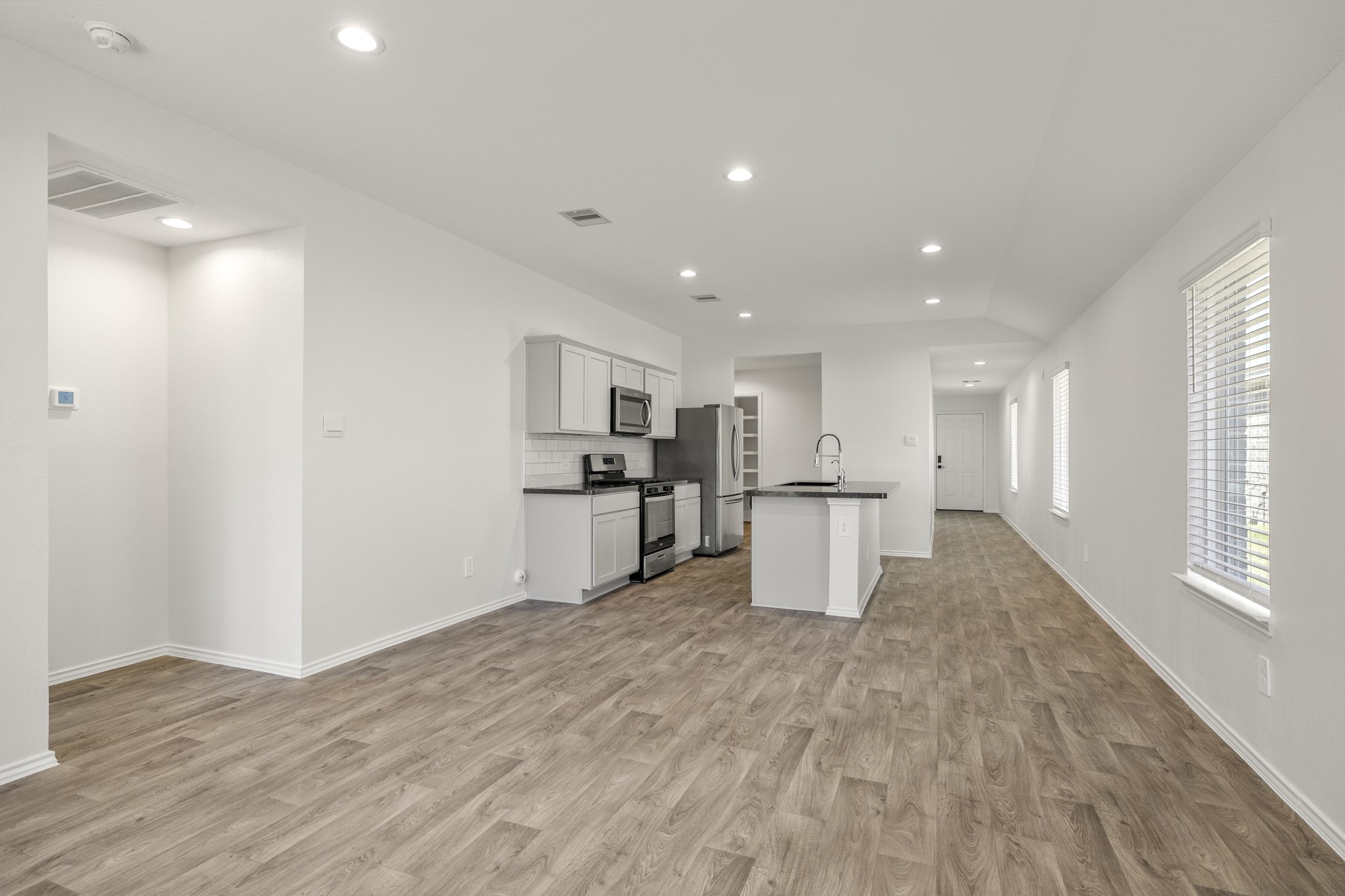 5402 Auburn Gardens Court Spring, TX 77373 - Photo 11 of 31 a view of kitchen with wooden floor