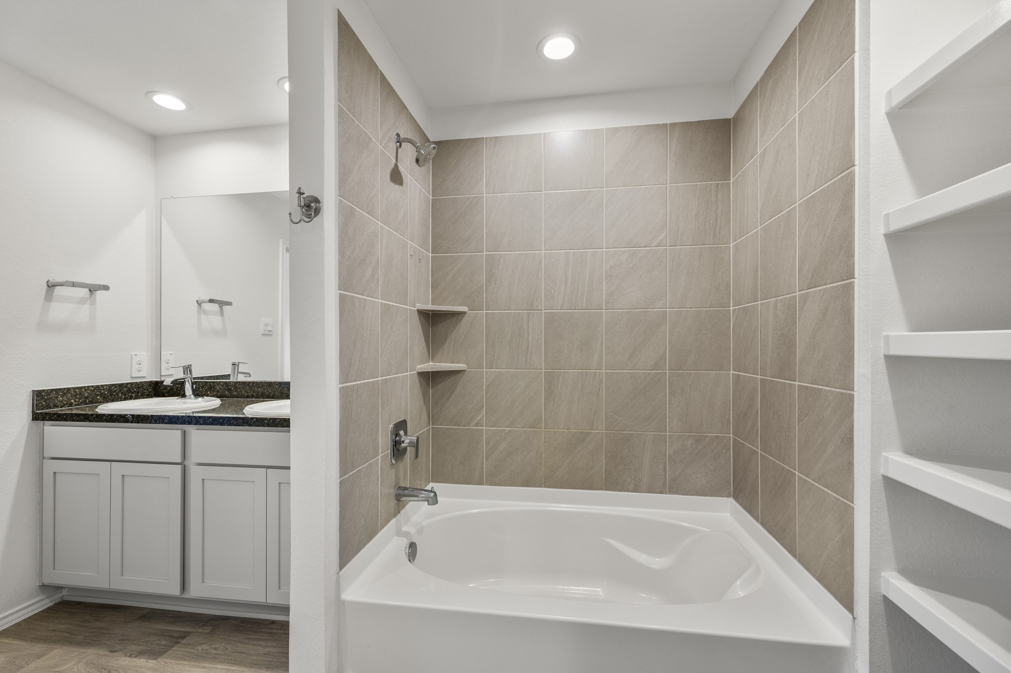 5402 Auburn Gardens Court Spring, TX 77373 - Photo 13 of 31 a bathroom with a granite countertop sink a toilet and shower