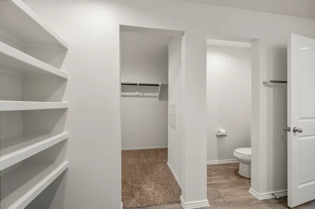 a view of bathroom with a toilet