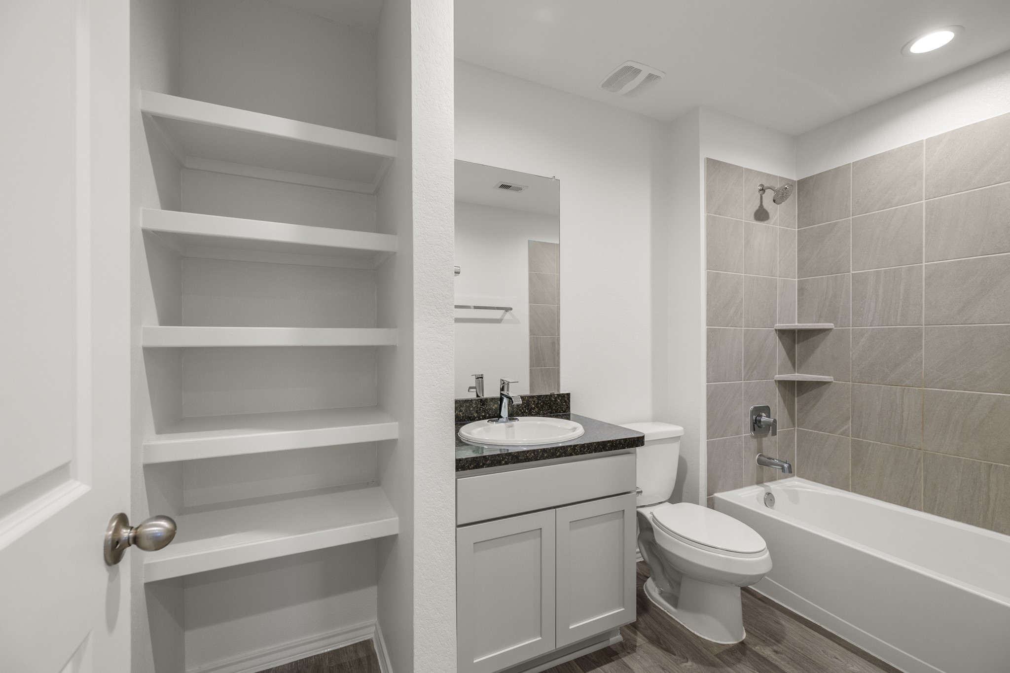5402 Auburn Gardens Court Spring, TX 77373 - Photo 18 of 31 a bathroom with a sink a toilet and shower