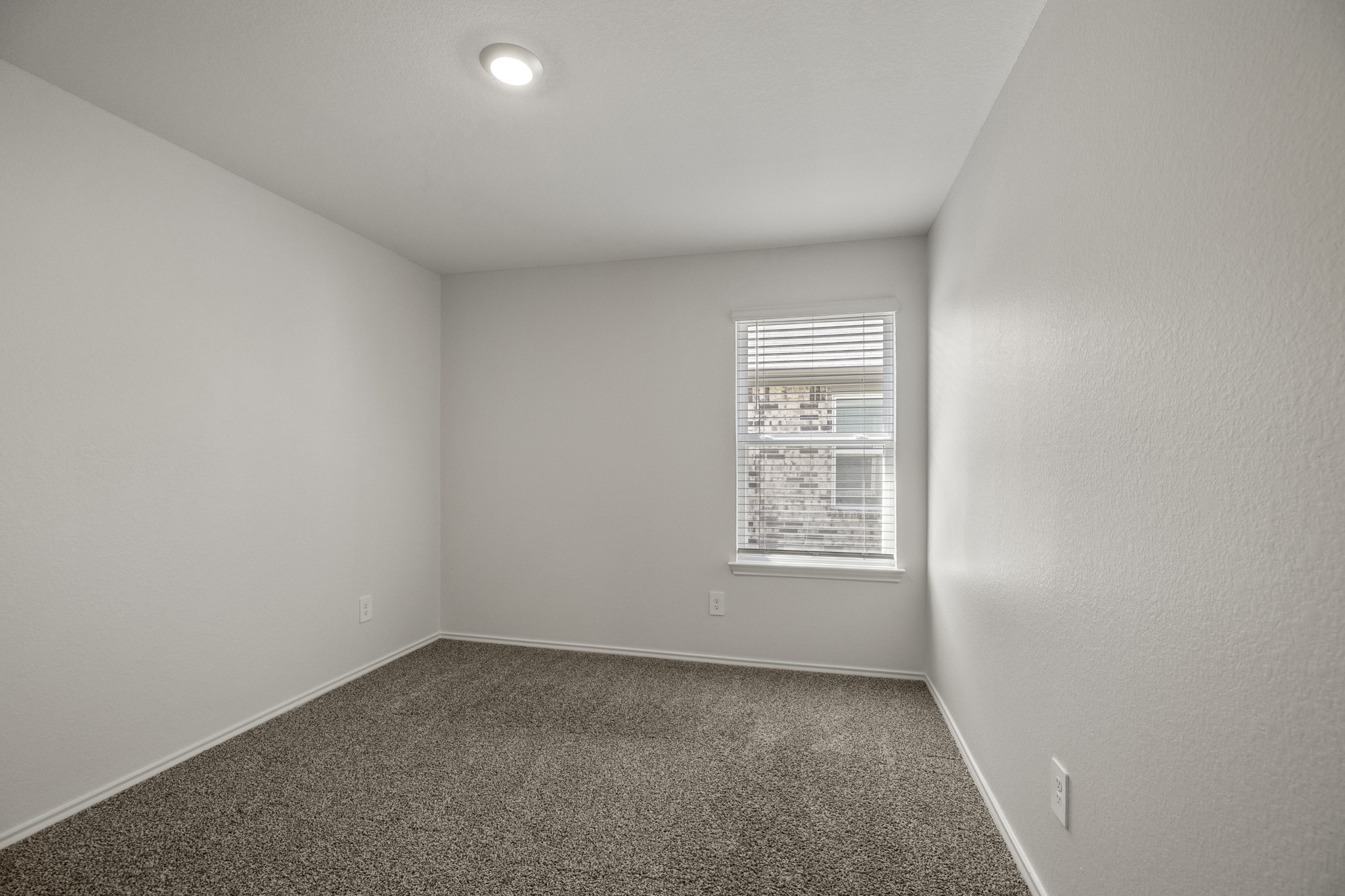 5402 Auburn Gardens Court Spring, TX 77373 - Photo 20 of 31 an empty room with a window