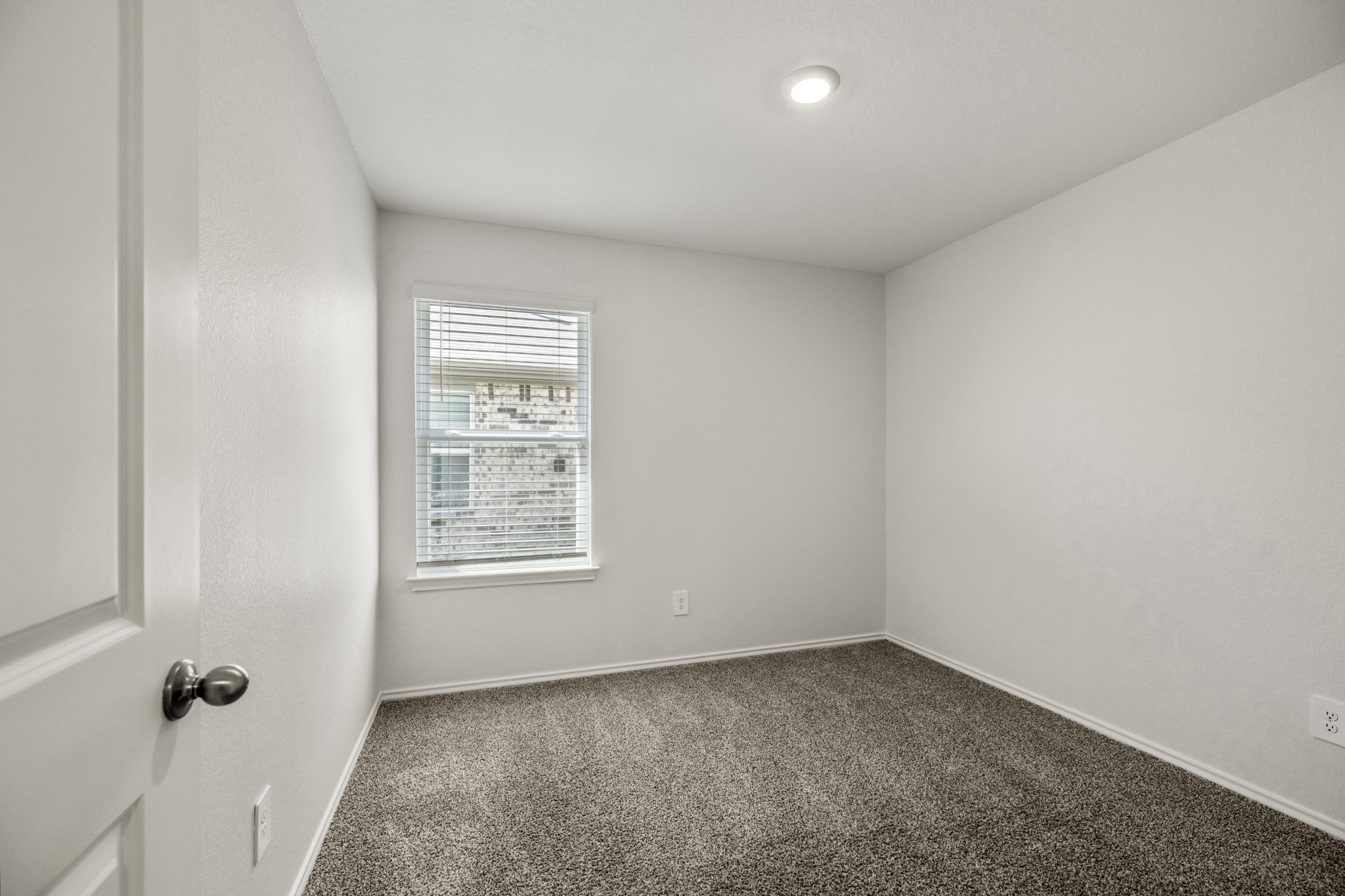 5402 Auburn Gardens Court Spring, TX 77373 - Photo 22 of 31 an empty room with a window