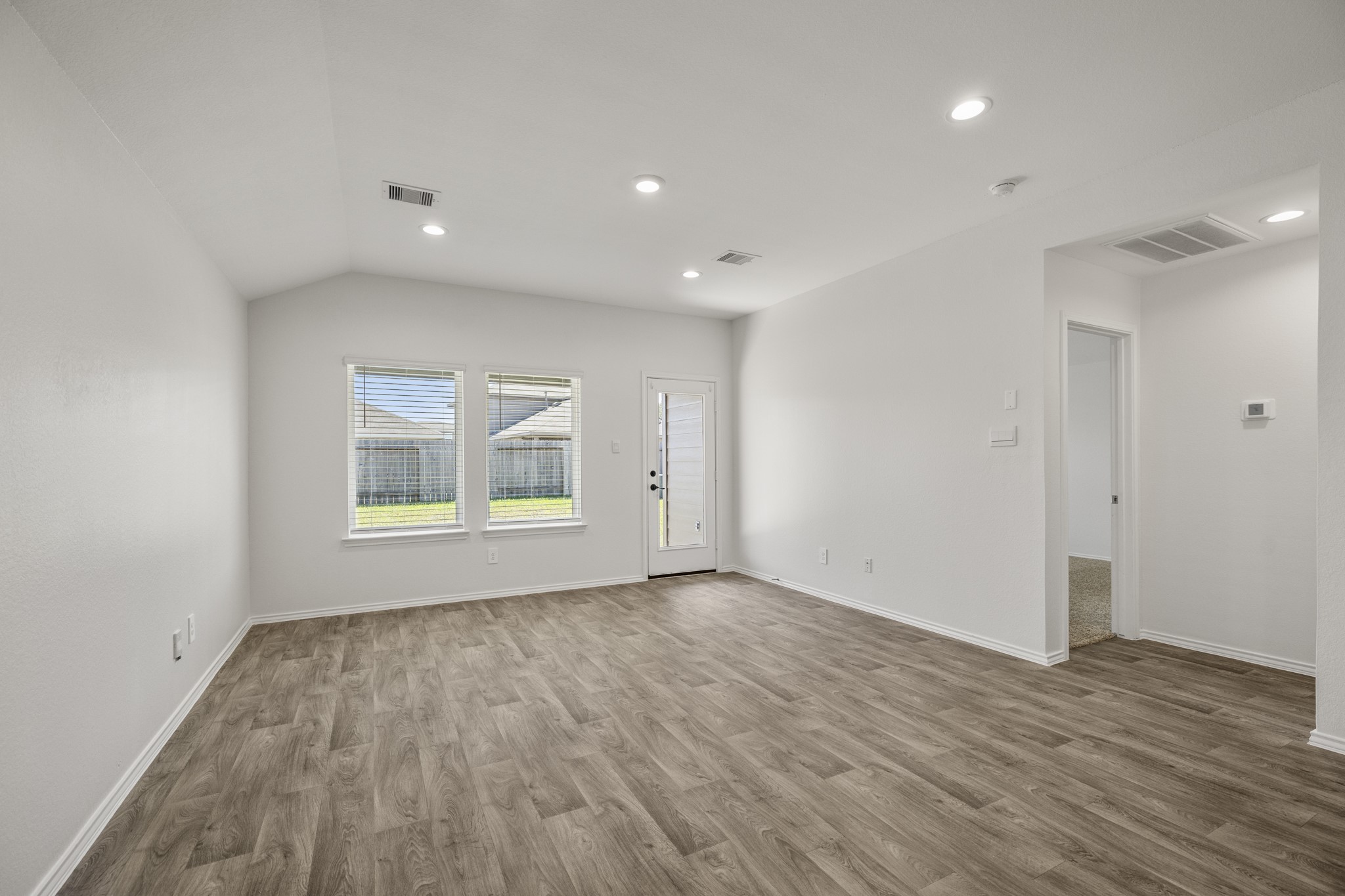 5402 Auburn Gardens Court Spring, TX 77373 - Photo 25 of 31 wooden floor in an empty room with a window