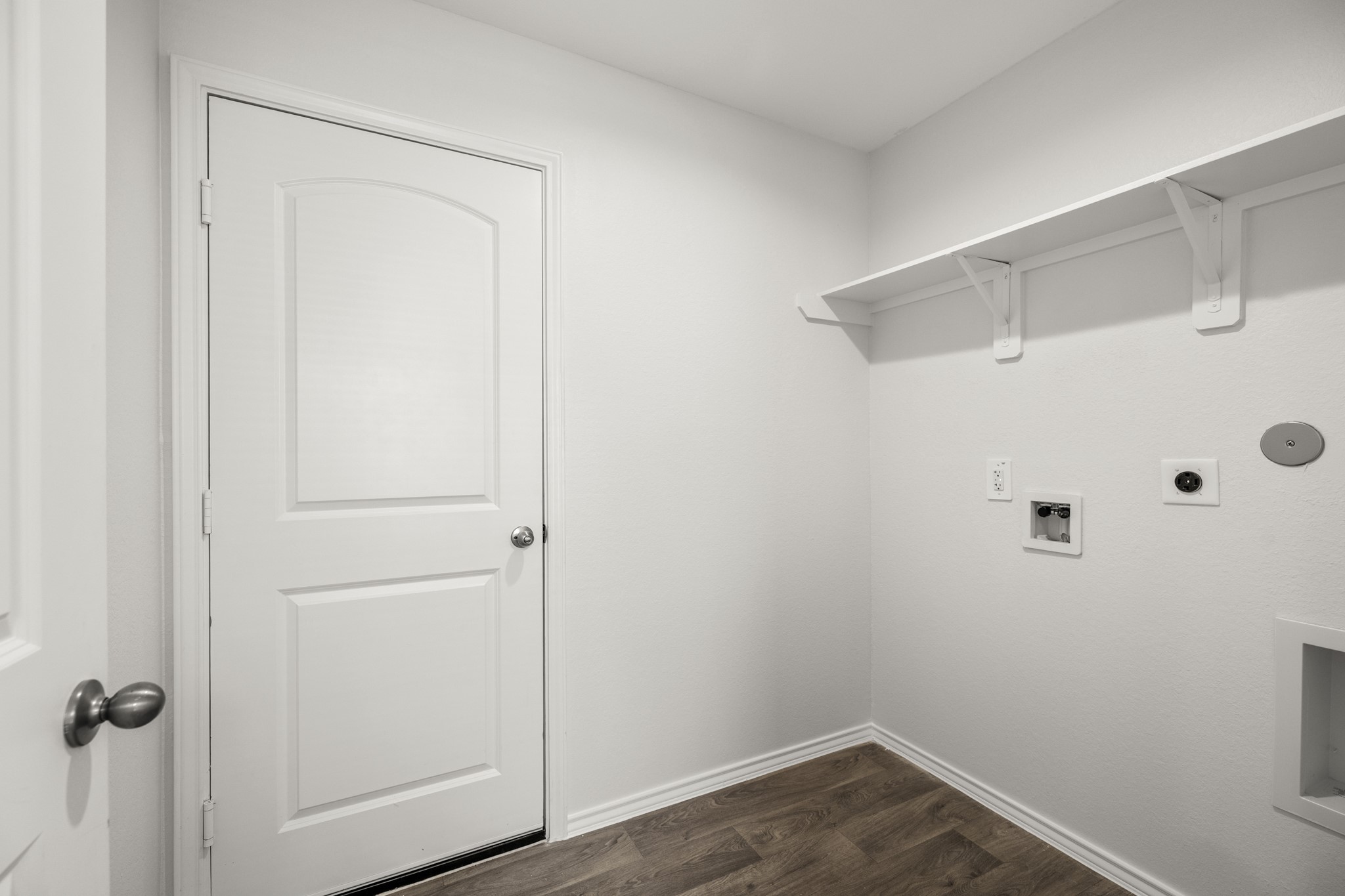 5402 Auburn Gardens Court Spring, TX 77373 - Photo 26 of 31 a view of a storage & utility room with wooden floor