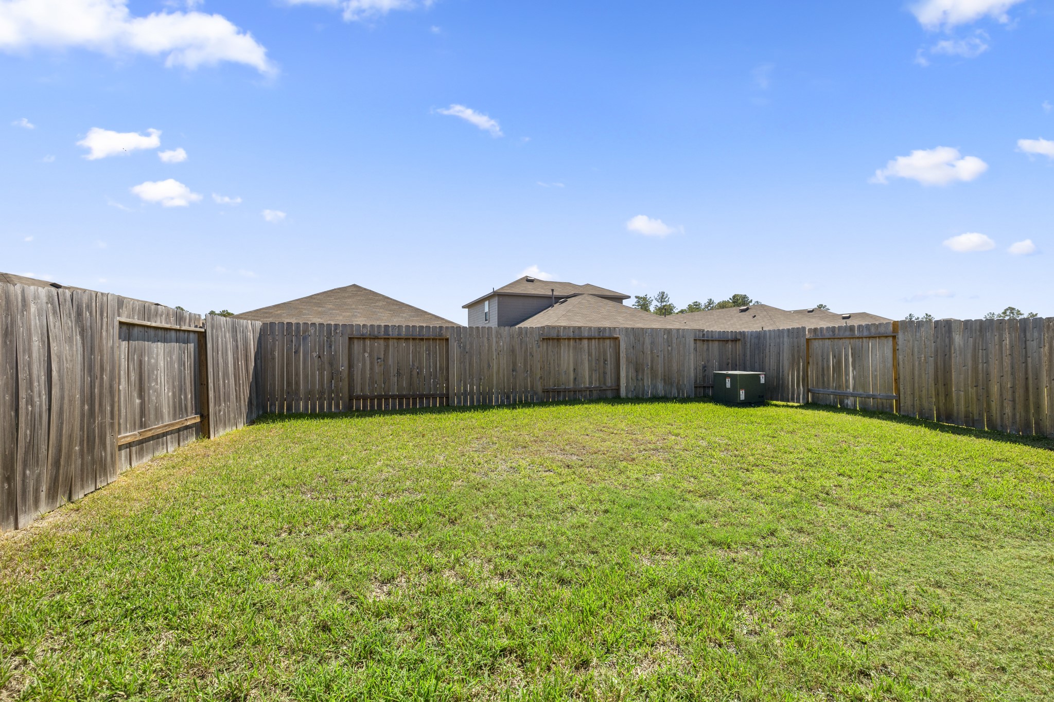 5402 Auburn Gardens Court Spring, TX 77373 - Photo 28 of 31 a view of a backyard with wooden fence