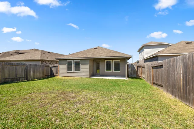 a front view of house with yard