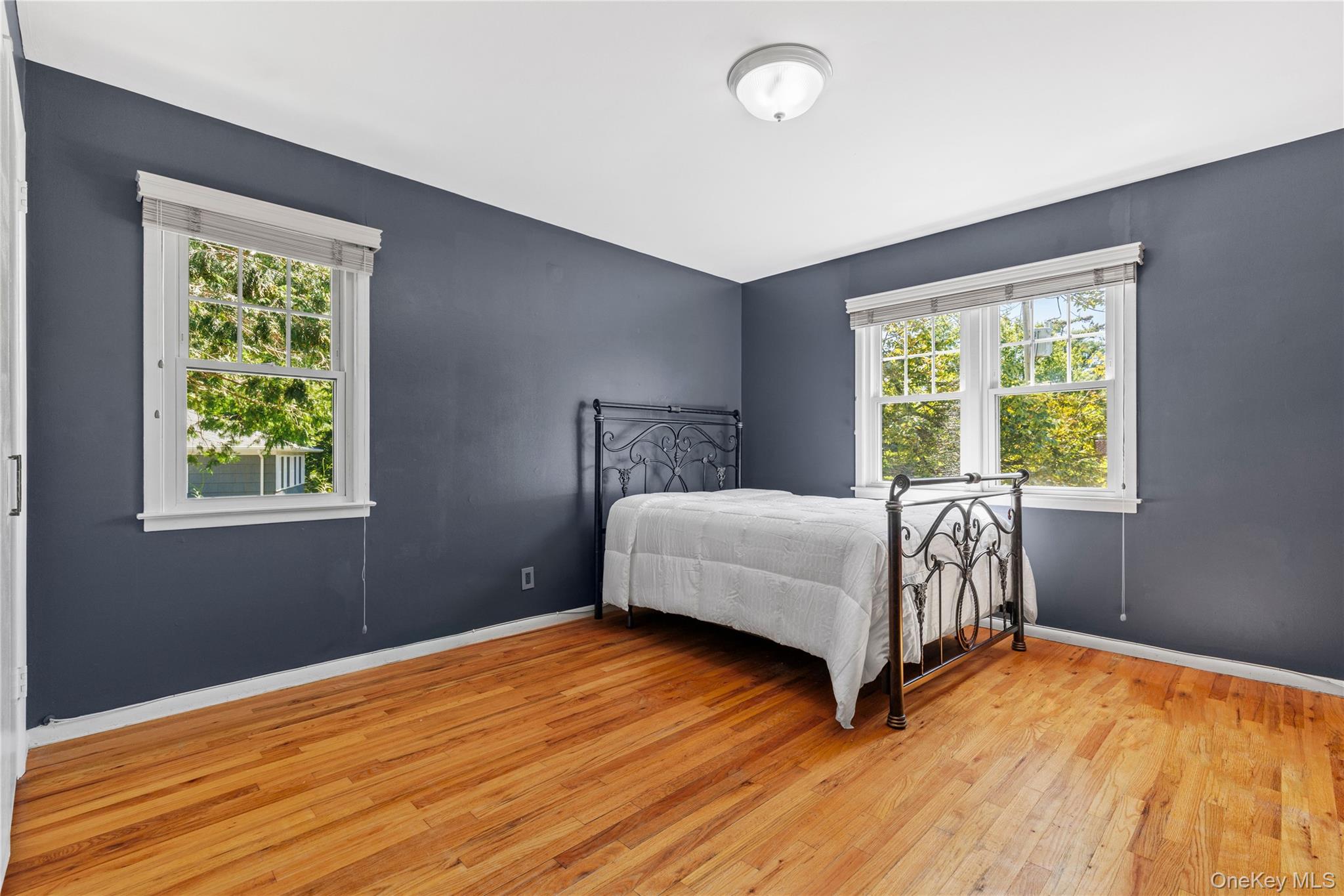 4 Mark Drive Rye Brook, NY 10573 - Photo 16 of 47 Bedroom with light wood finished floors and baseboards