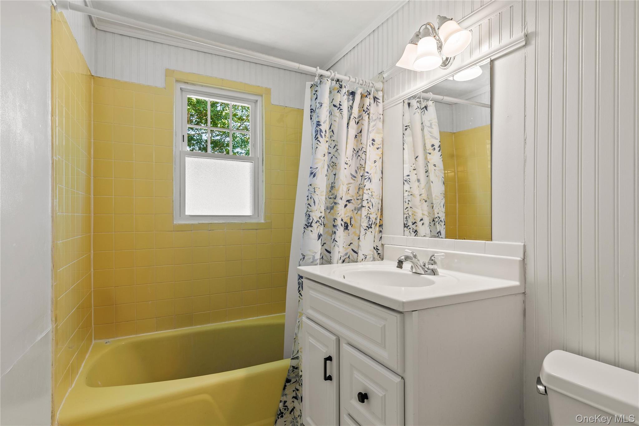 4 Mark Drive Rye Brook, NY 10573 - Photo 22 of 47 Bathroom featuring shower / tub combo with curtain and vanity