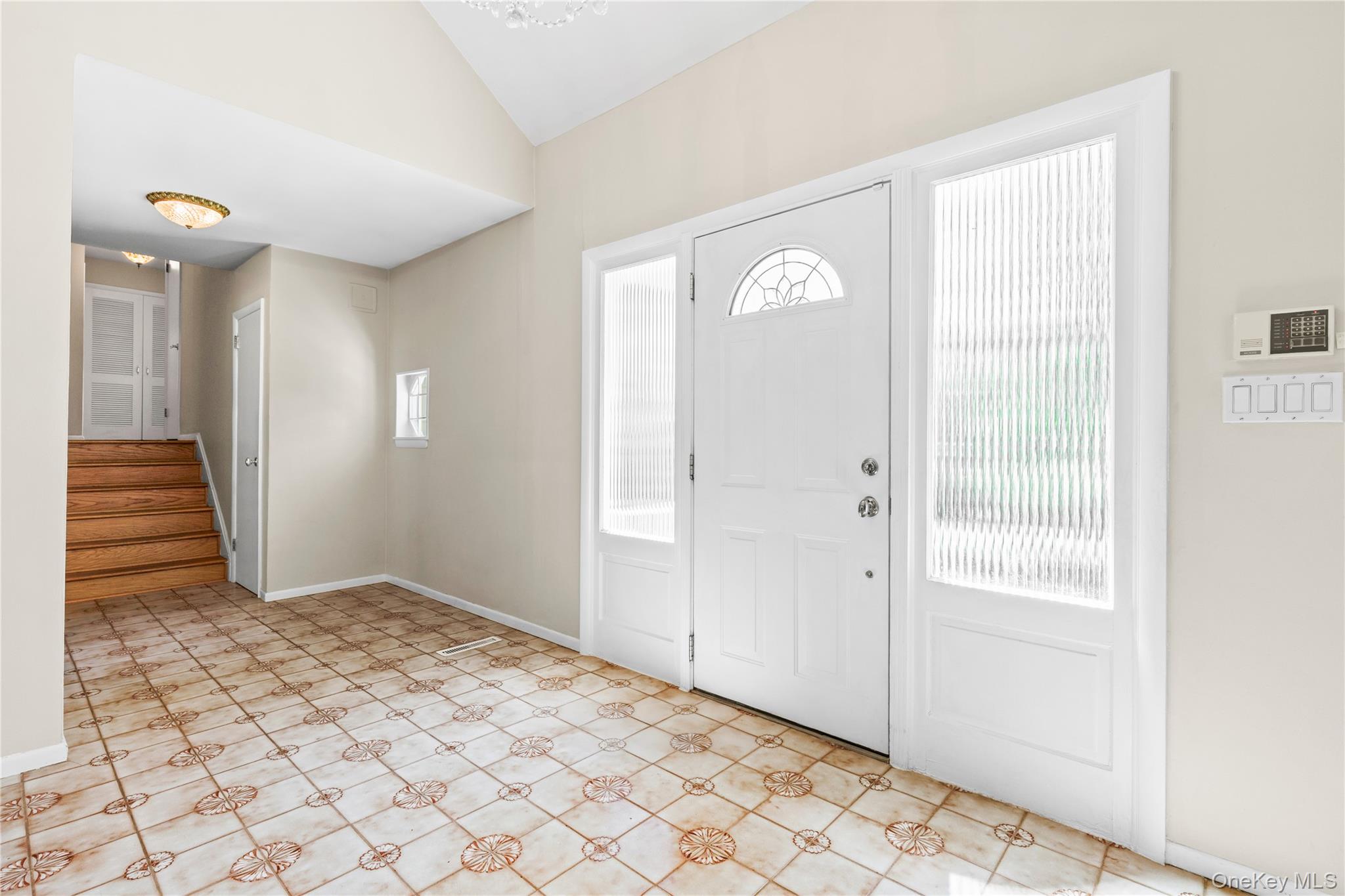 4 Mark Drive Rye Brook, NY 10573 - Photo 3 of 47 Entryway with stairs and lofted ceiling