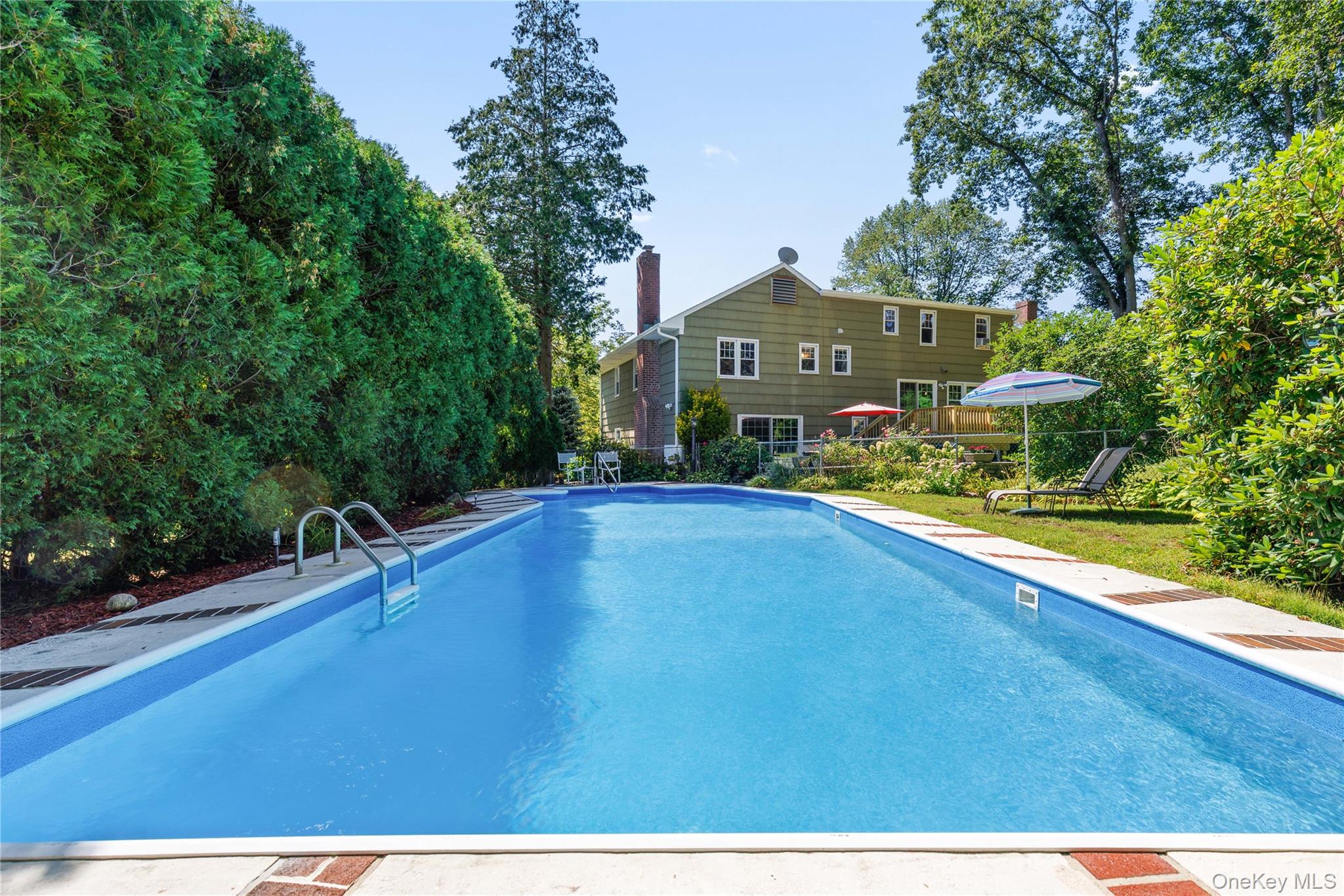 4 Mark Drive Rye Brook, NY 10573 - Photo 37 of 47 Swimming pool with a patio