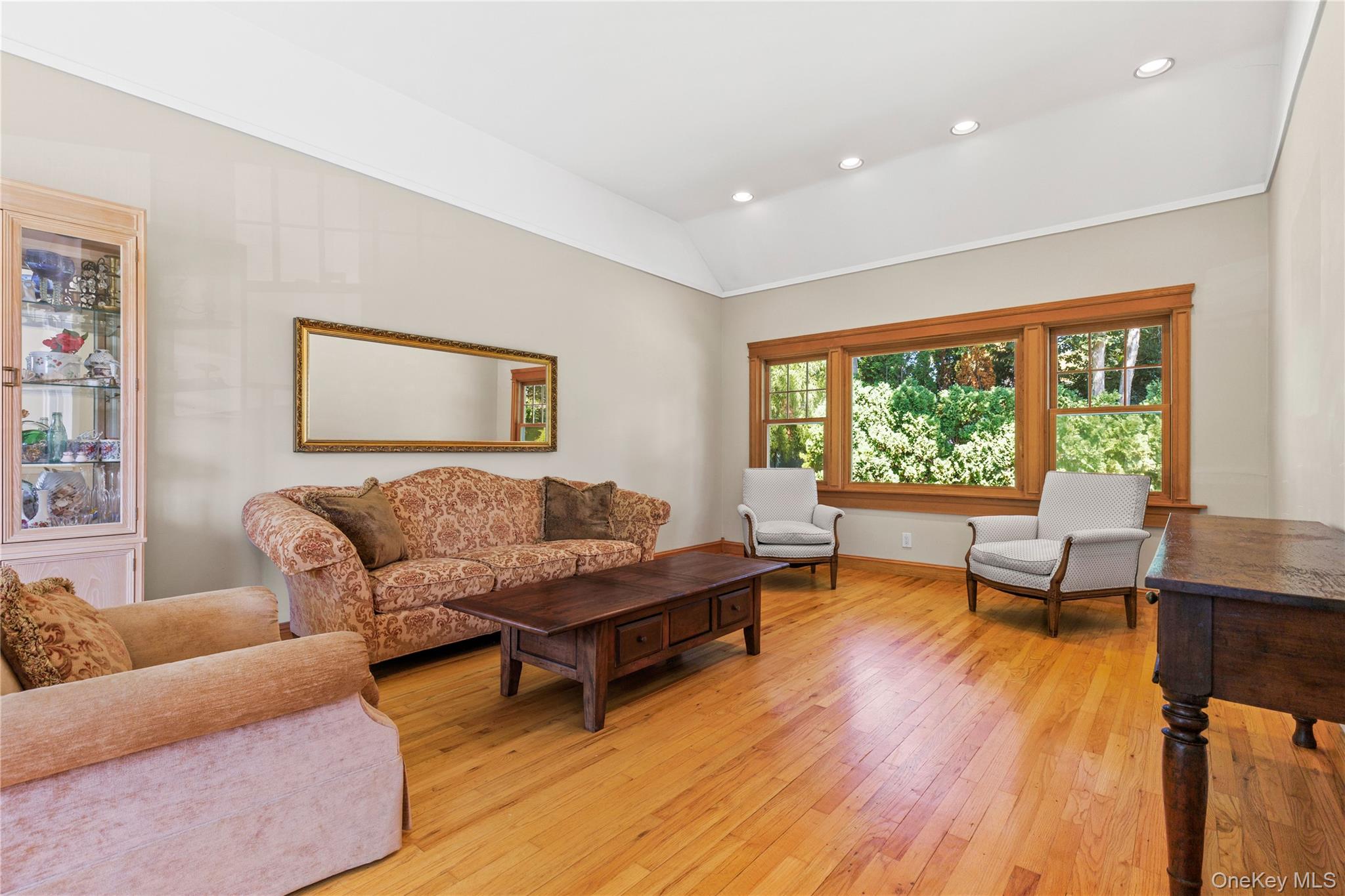 4 Mark Drive Rye Brook, NY 10573 - Photo 6 of 47 Living room featuring recessed lighting, light wood finished floors, and vaulted ceiling