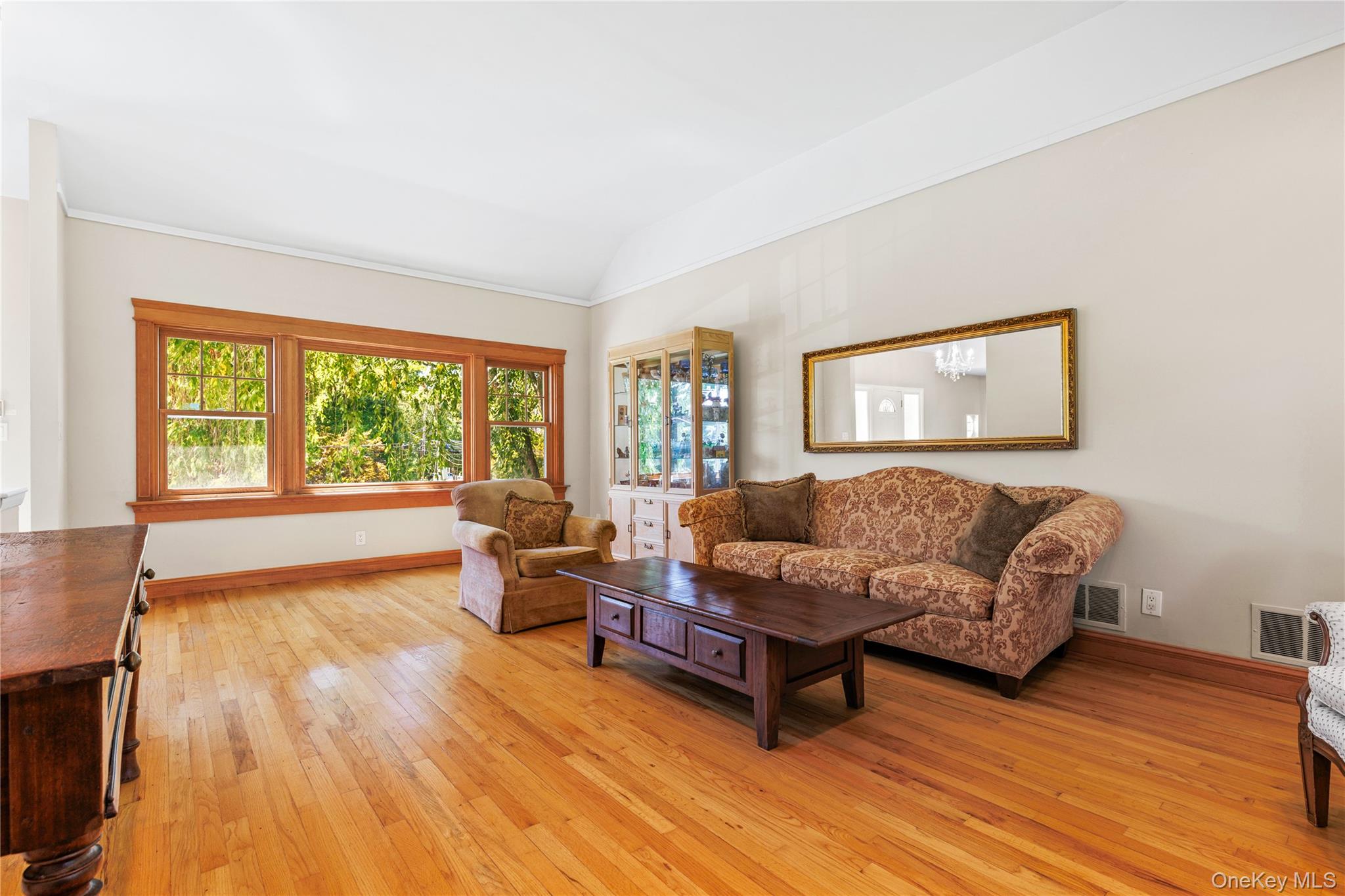 4 Mark Drive Rye Brook, NY 10573 - Photo 7 of 47 Living room featuring light wood-style flooring and lofted ceiling