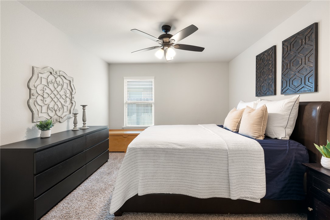 2018 Eagle View Drive Navasota, TX 77868 - Photo 20 of 28 a bedroom with a bed and window