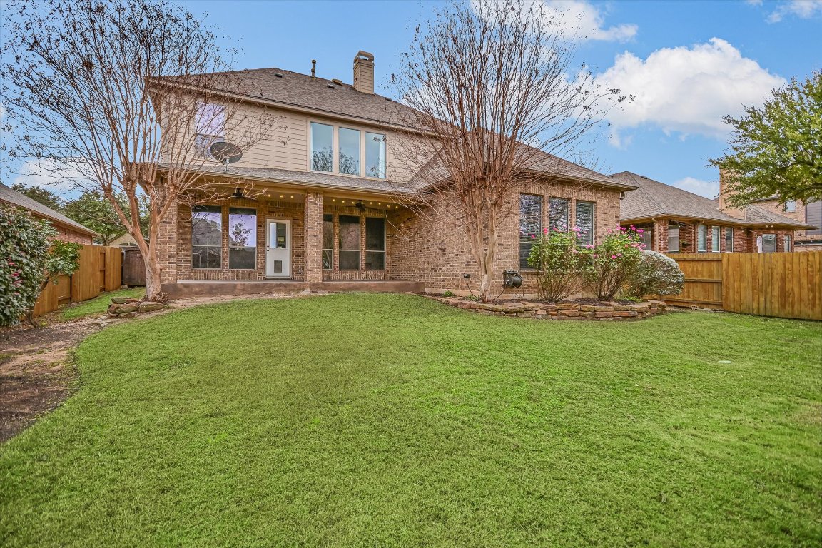 1911 Misty Ridge Leander, TX 78641 - Photo 27 of 30 a view of a house with a yard