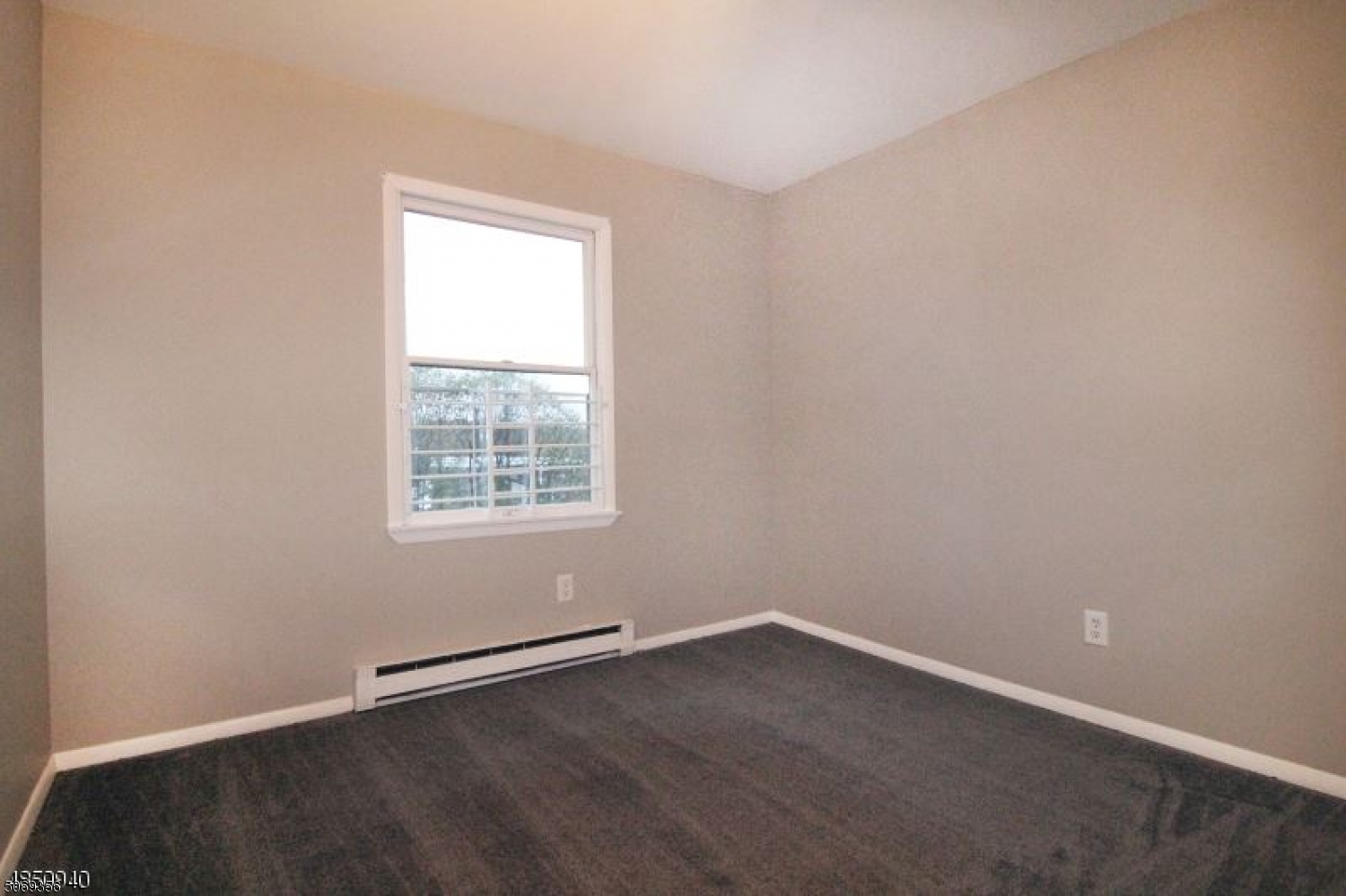 223 Liberty Street, Unit 2 Boonton, NJ 07005 - Photo 5 of 7 an empty room with a window