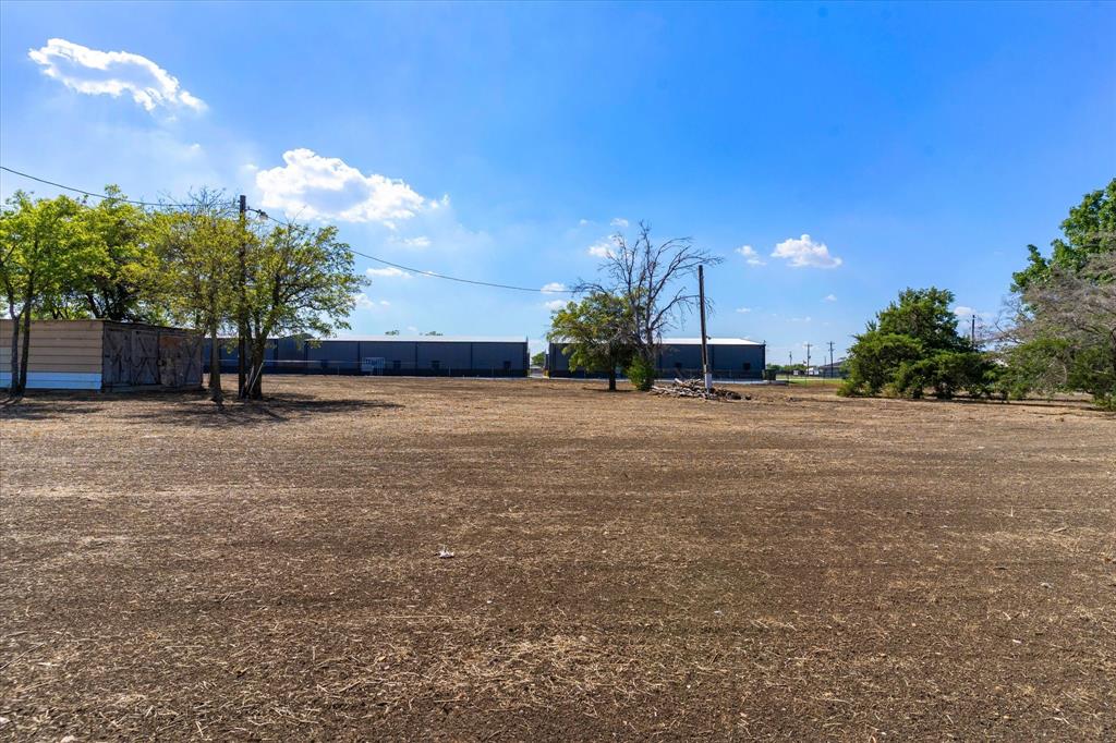 17326 Gaffield Road Justin, TX 76247 - Photo 9 of 21 Expansive open lot with a clear, level terrain