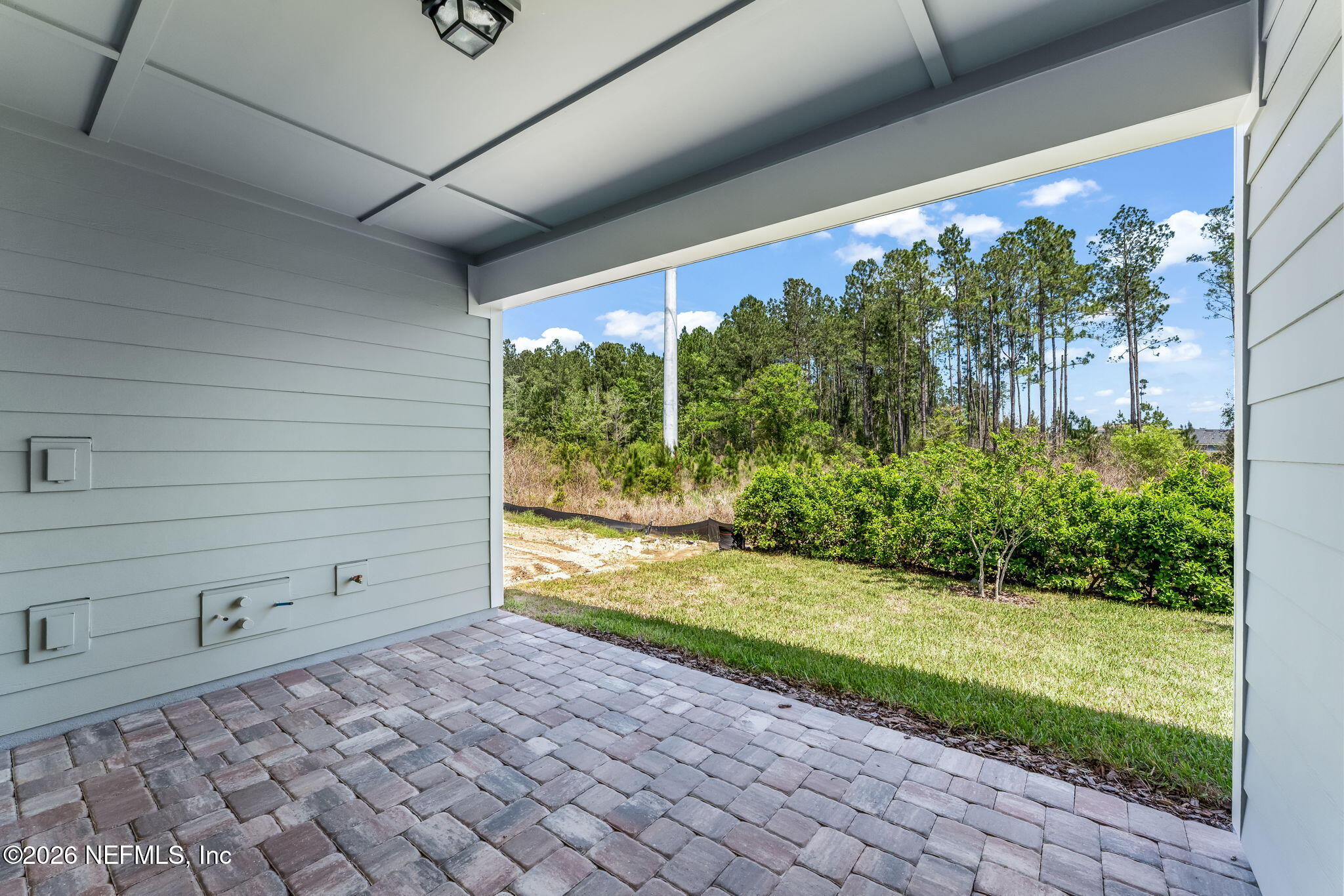614 Ecliptic Loop Yulee, FL 32097 - Photo 34 of 60 36-web-or-mls-Covered Patio