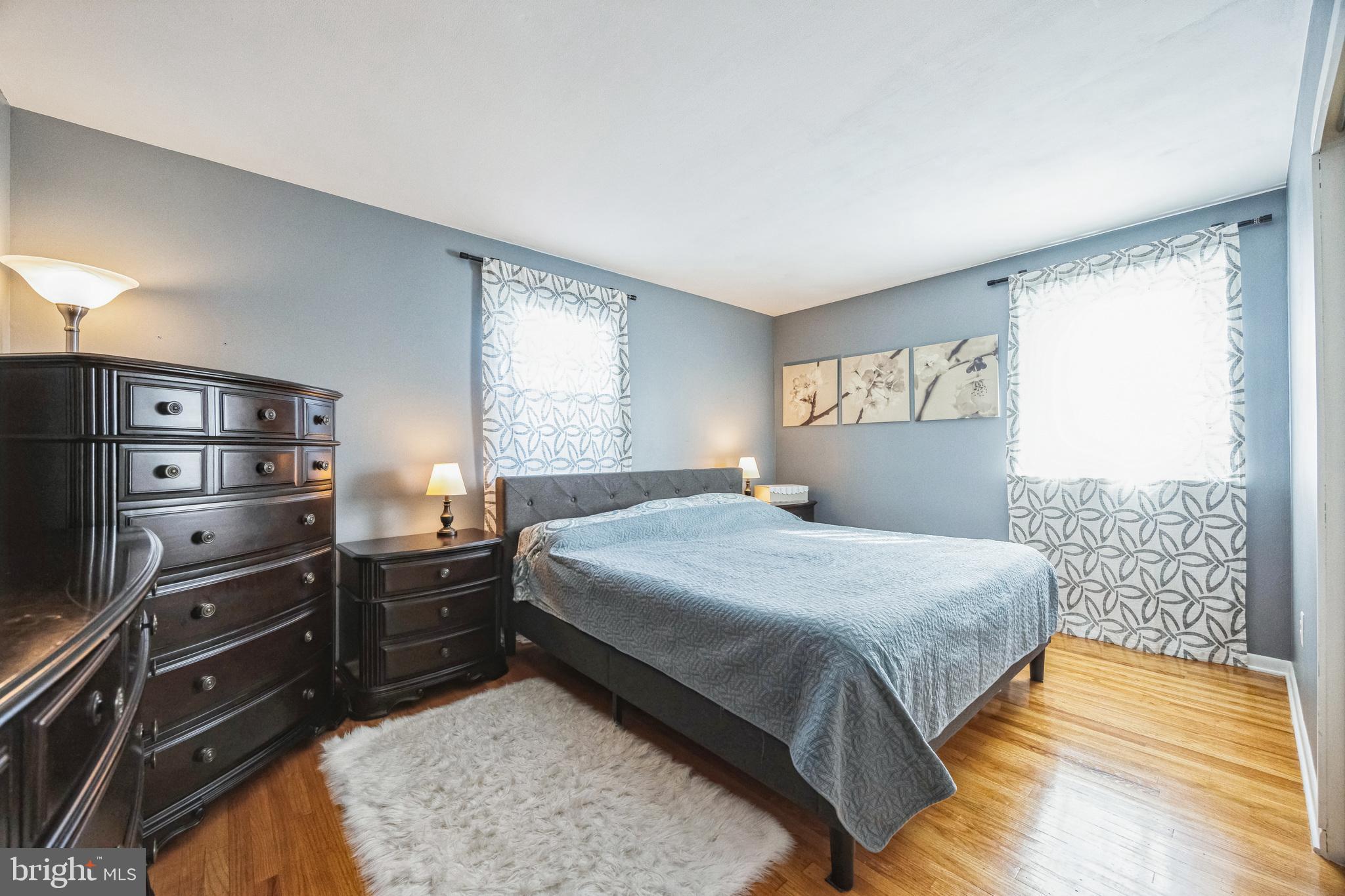 333 Davis Avenue Mount Ephraim, NJ 08059 - Photo 12 of 34 a bedroom with a bed and a window