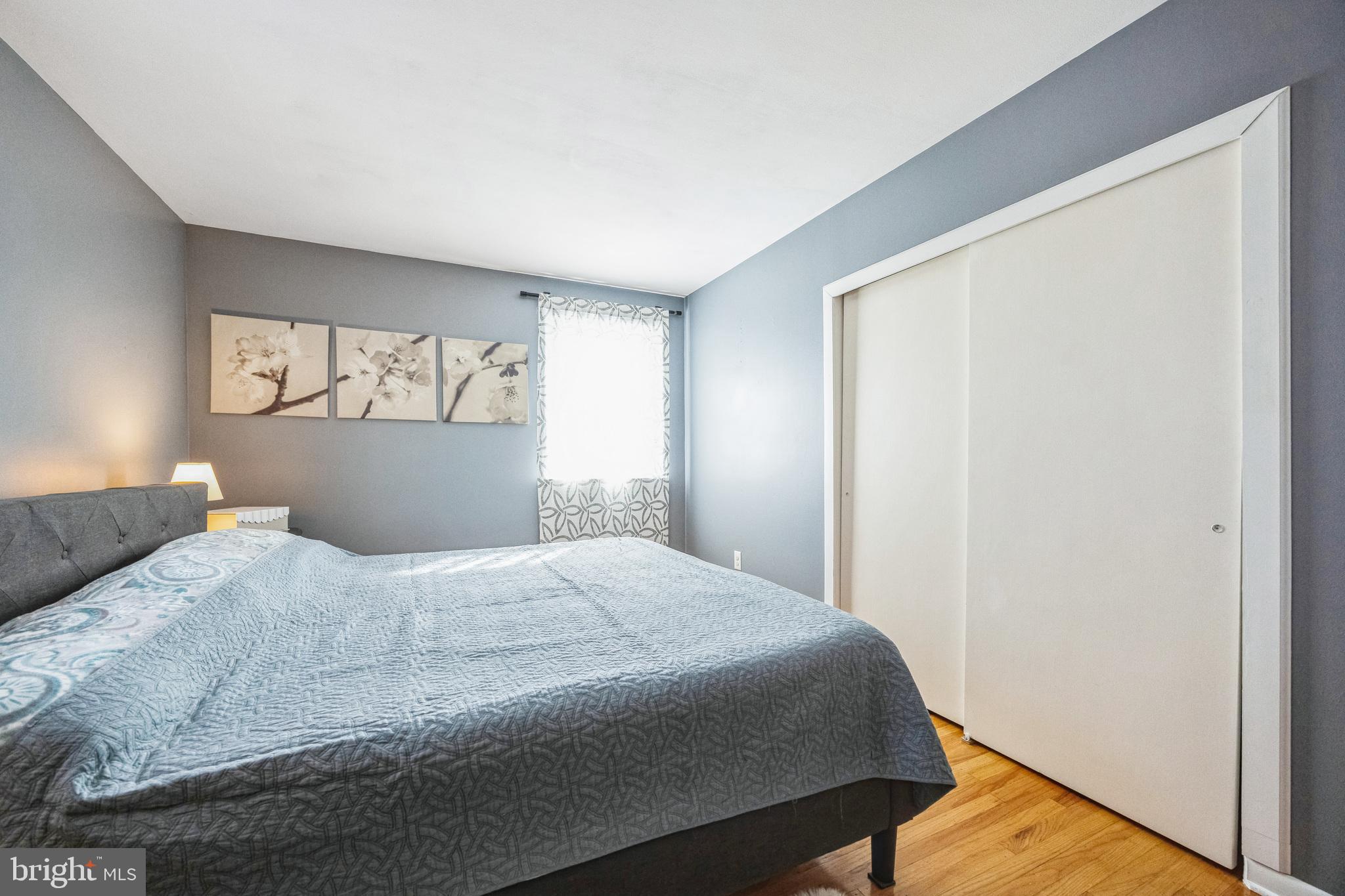 333 Davis Avenue Mount Ephraim, NJ 08059 - Photo 14 of 34 a bedroom with a bed and a window