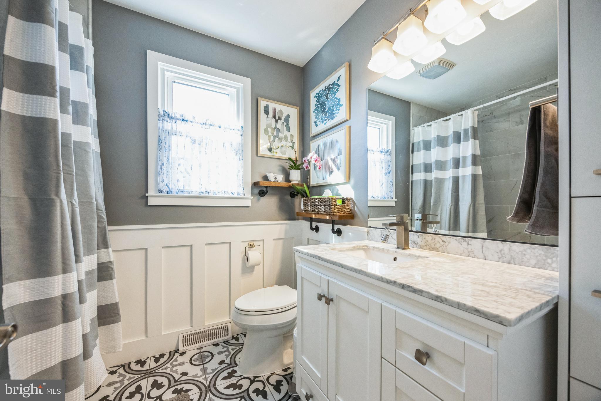 333 Davis Avenue Mount Ephraim, NJ 08059 - Photo 18 of 34 a bathroom with a granite countertop sink toilet and shower