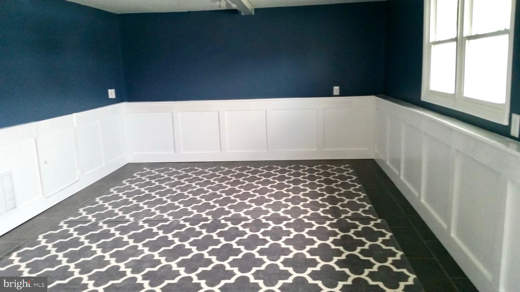 333 Davis Avenue Mount Ephraim, NJ 08059 - Photo 23 of 34 a bathroom with a black white checkered floor