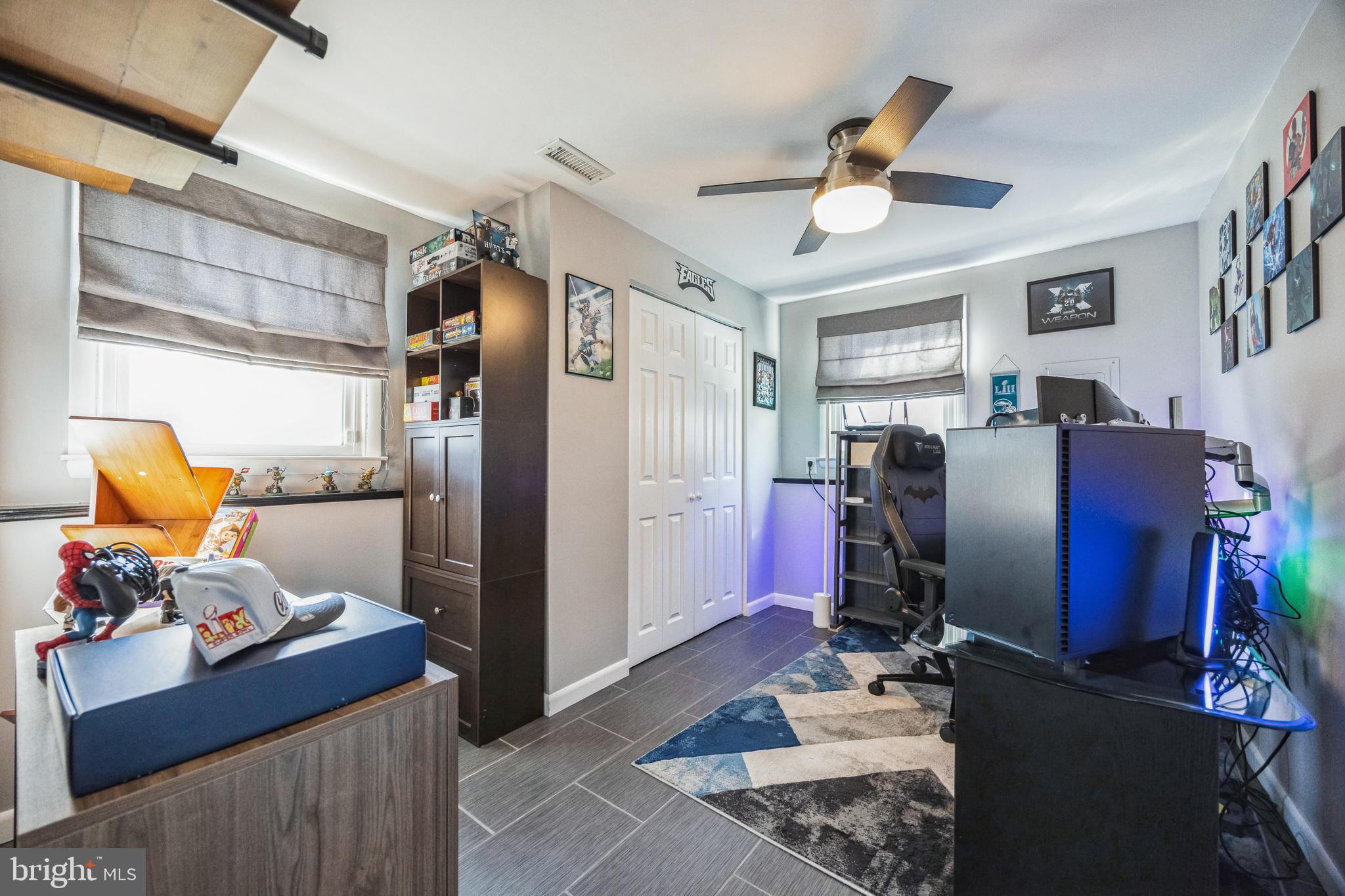 333 Davis Avenue Mount Ephraim, NJ 08059 - Photo 24 of 34 a view of a workspace with furniture and gym equipment