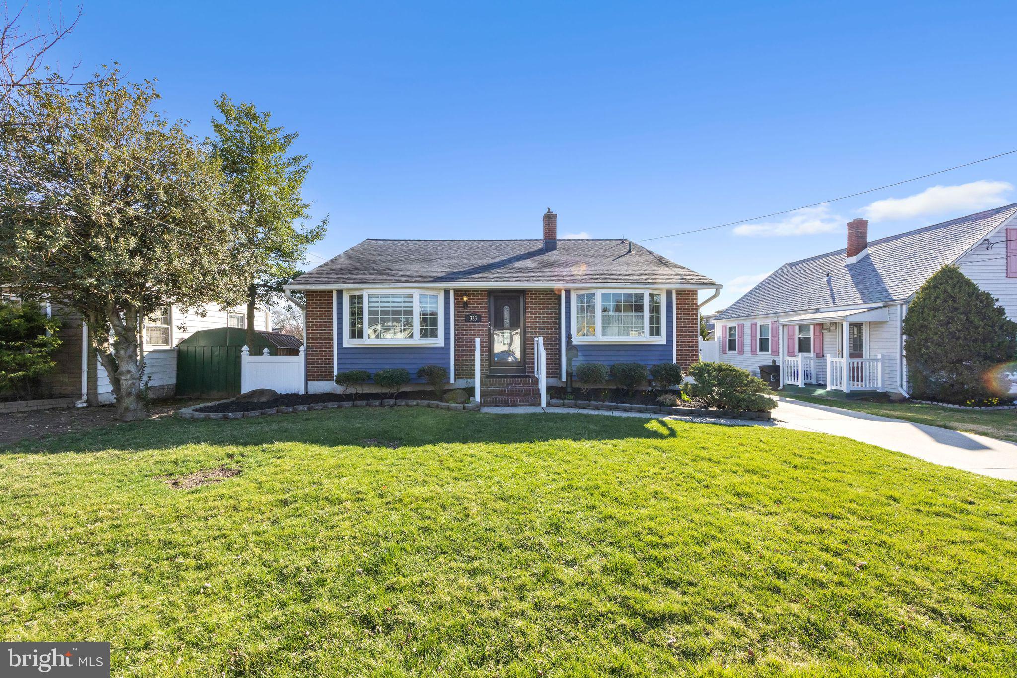 333 Davis Avenue Mount Ephraim, NJ 08059 - Photo 32 of 34 a front view of a house with a garden