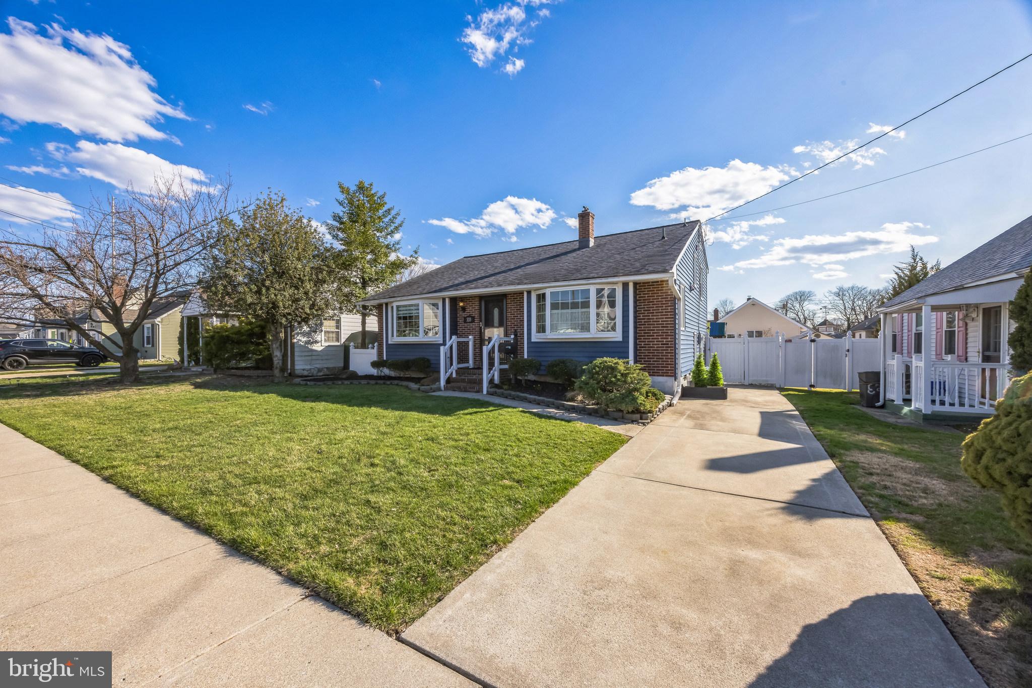 333 Davis Avenue Mount Ephraim, NJ 08059 - Photo 33 of 34 a front view of a house with a yard