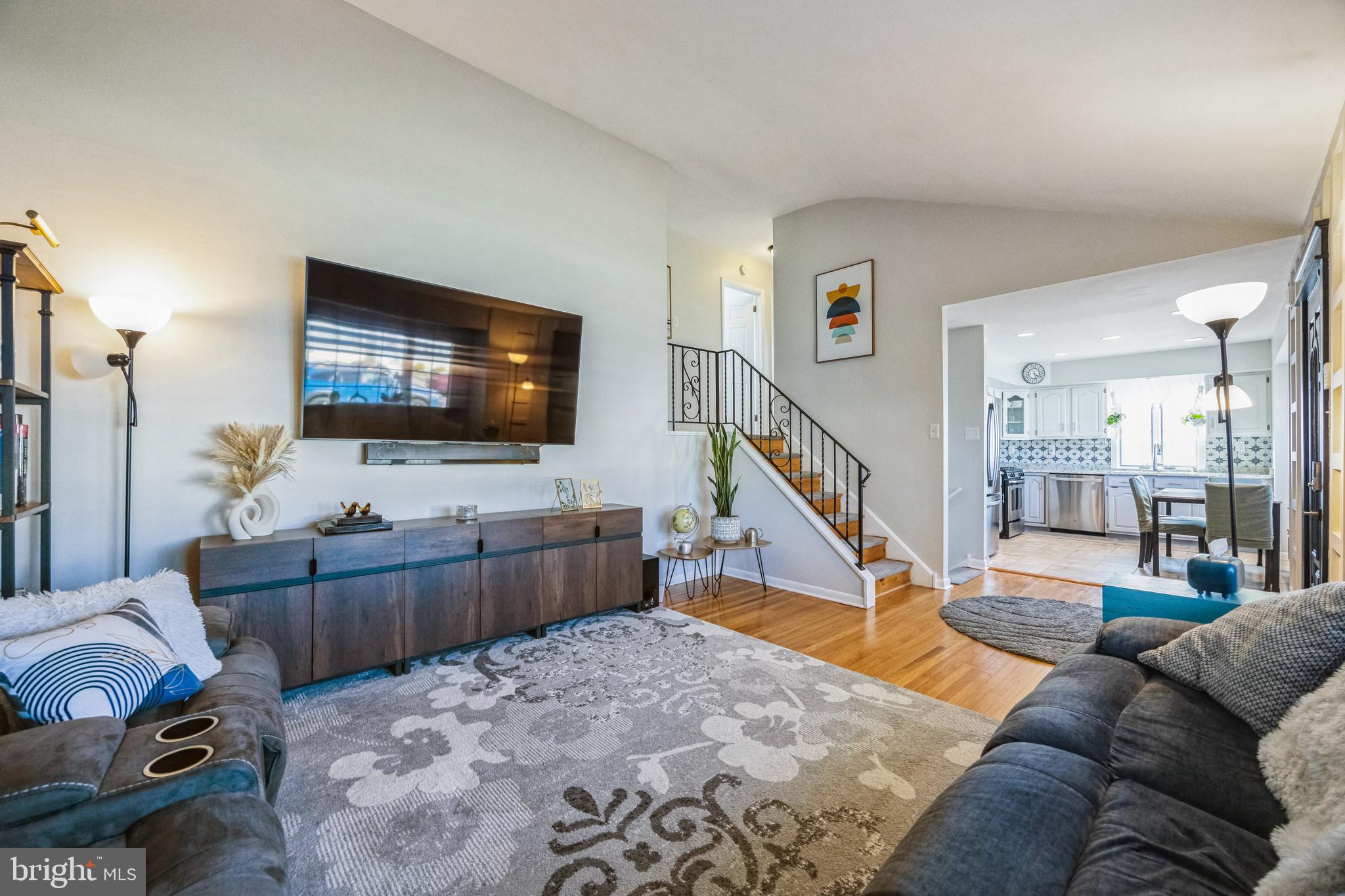333 Davis Avenue Mount Ephraim, NJ 08059 - Photo 4 of 34 a living room with furniture and a flat screen tv