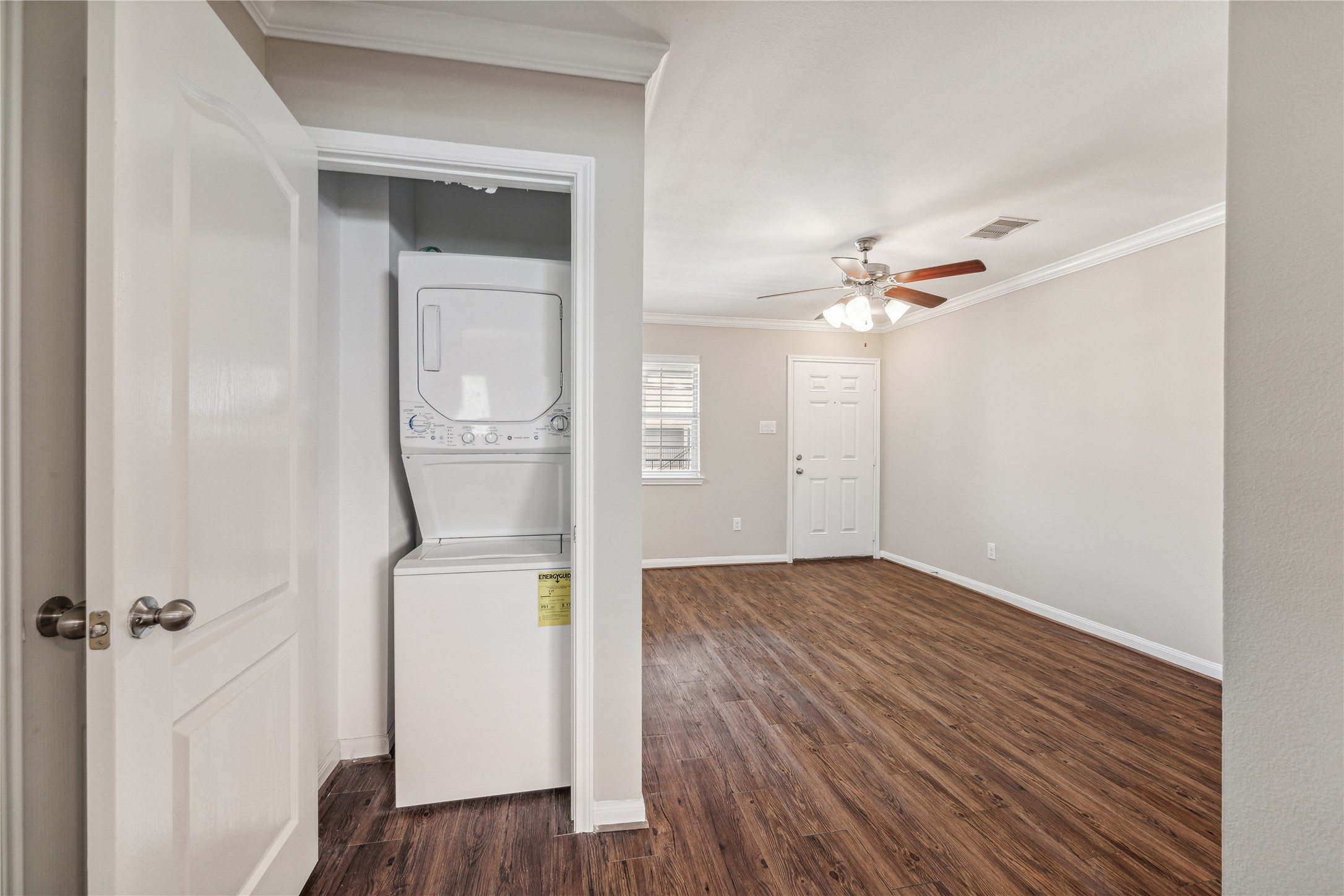 427 West 16th Street, Unit 2 Houston, TX 77008 - Photo 3 of 7 a view of empty room with wooden floor