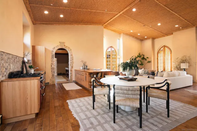 a view of a swimming pool with outdoor seating