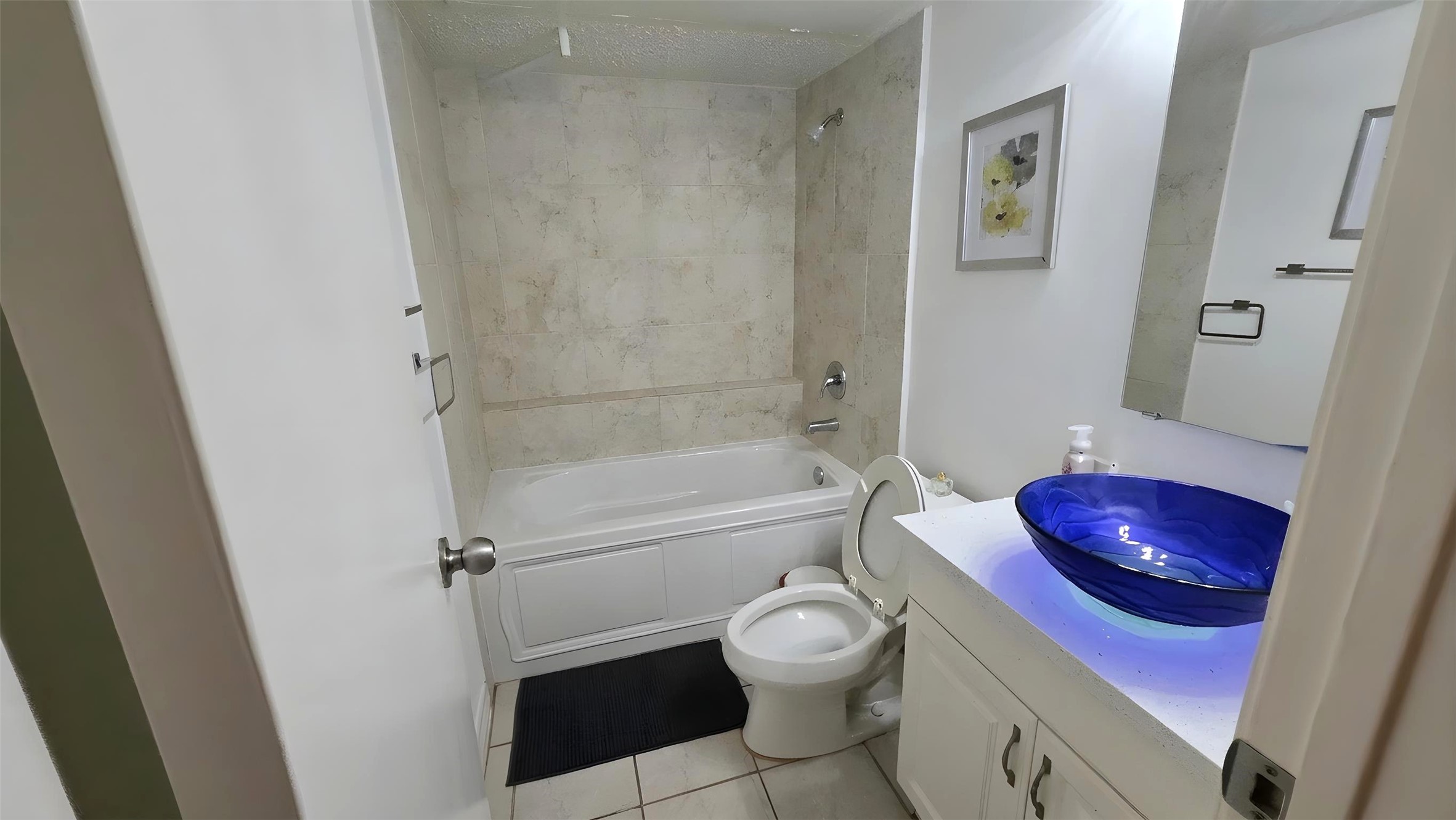 6601 Sands Point Drive, Unit 34 Houston, TX 77074 - Photo 10 of 24 a bathroom with a toilet and a shower