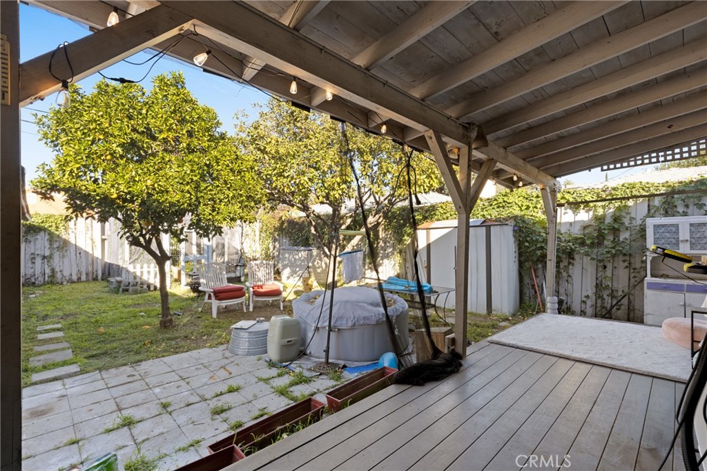 17415 Collins Street Encino, CA 91316 - Photo 14 of 14 a view of a backyard with wooden floor