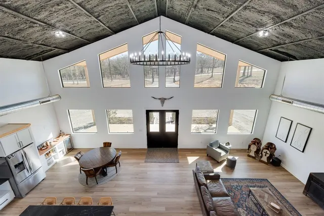 a bedroom with a bed and a painting