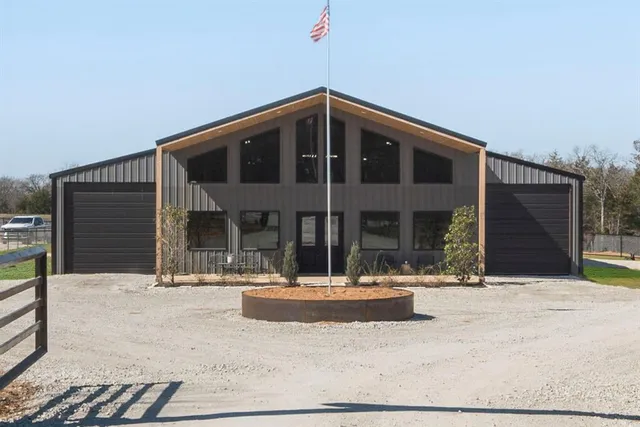 a lobby with furniture and window