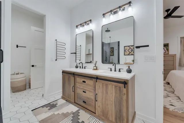 a bathroom with a shower and a sink