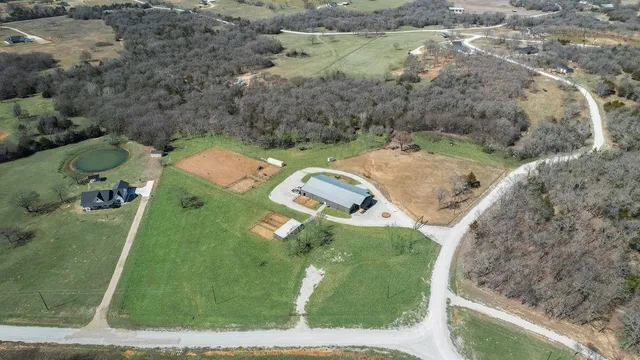a view of a lake with a yard