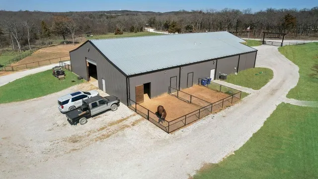 a view of a swimming pool with a yard