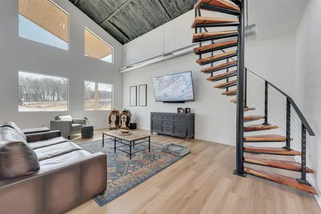a living room with furniture and a rug