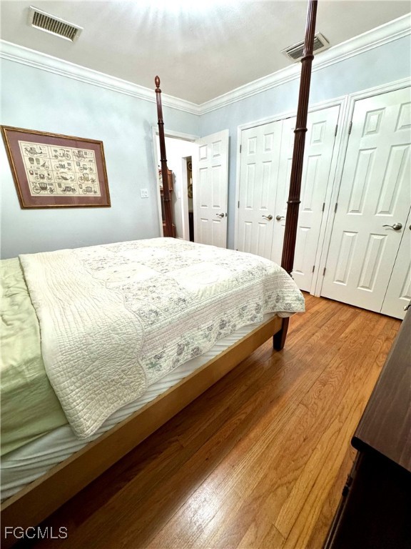 1640 Marlyn Road Fort Myers, FL 33901 - Photo 36 of 48 a bed sitting in a bedroom next to a window