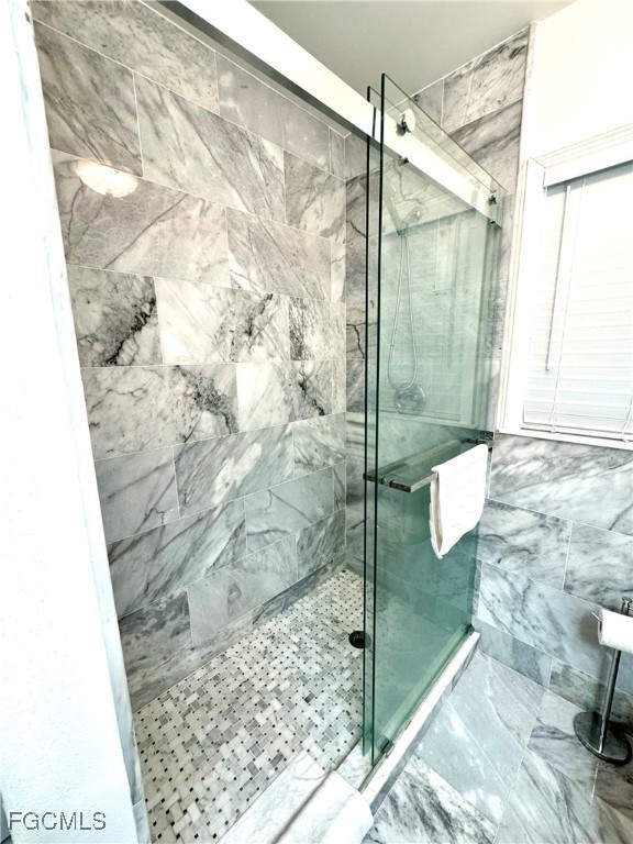 1640 Marlyn Road Fort Myers, FL 33901 - Photo 37 of 48 a bathroom with a shower