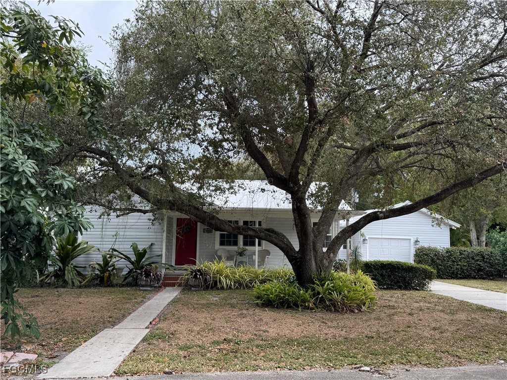 1640 Marlyn Road Fort Myers, FL 33901 - Photo 44 of 48 a front view of a house with a garden